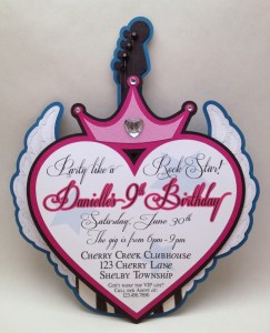 The invite is printed on a removable piece that inserts into the back